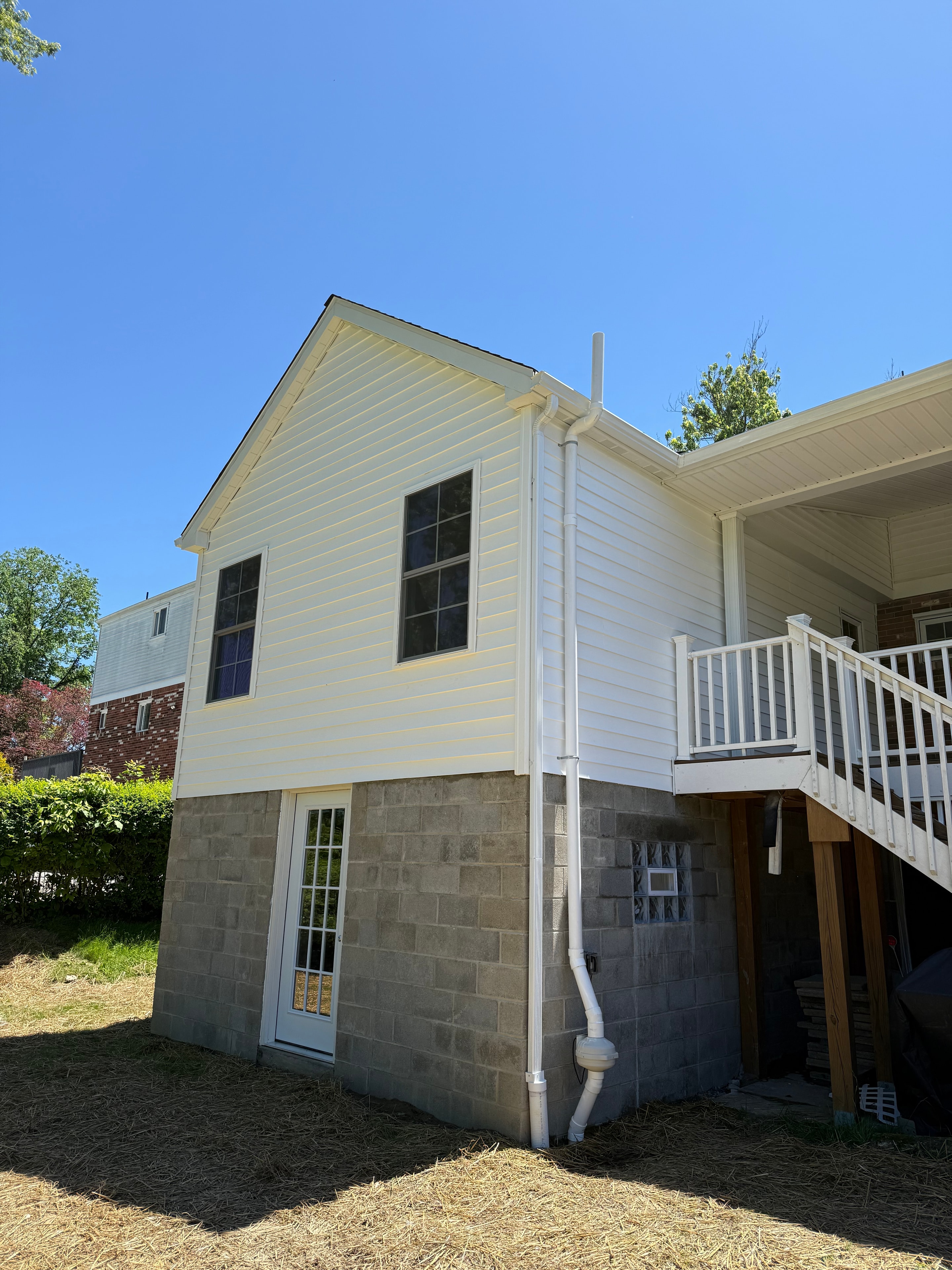 Metal siding rear view with gutters