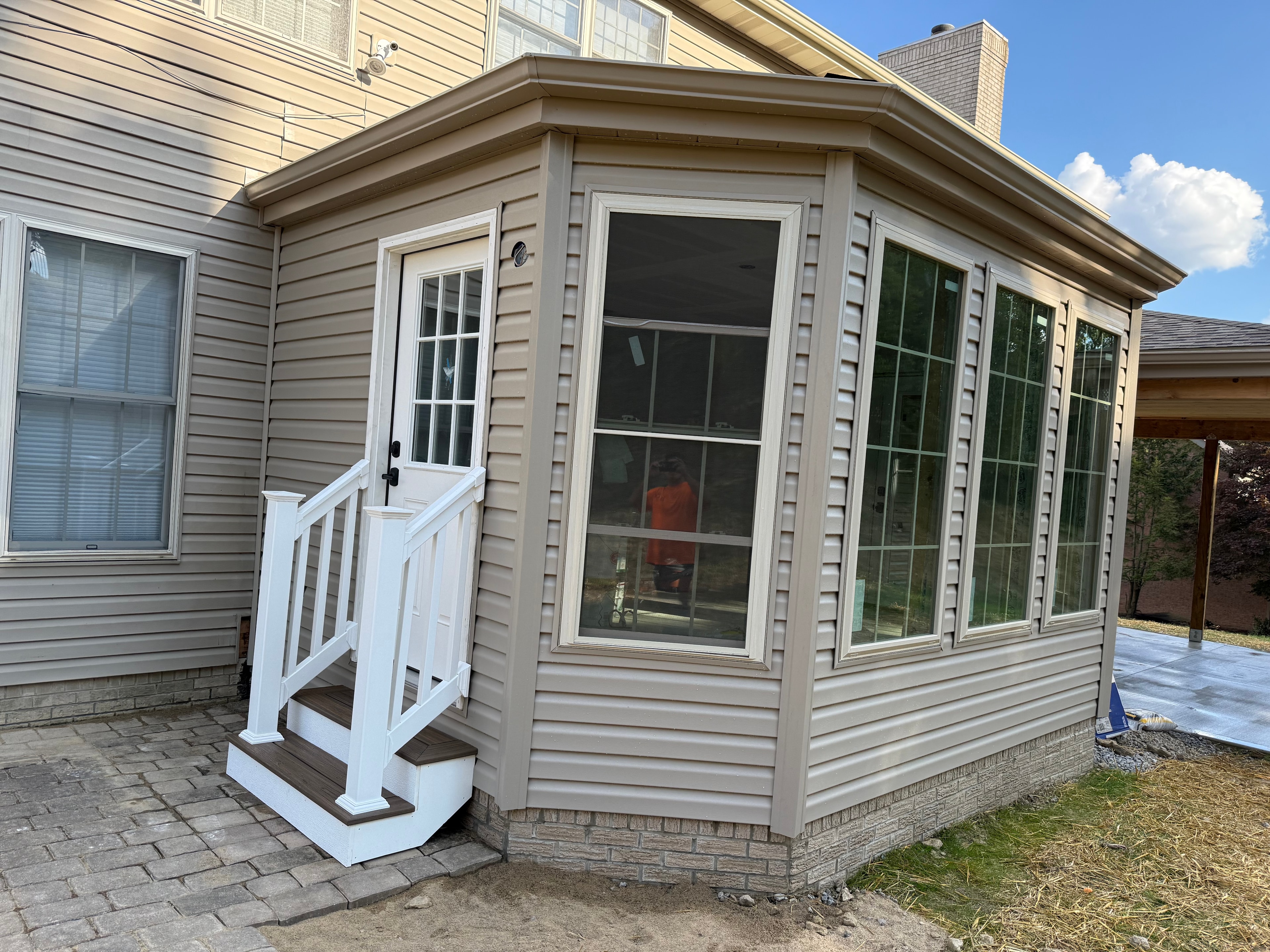 Sunroom addition closeup with large windows